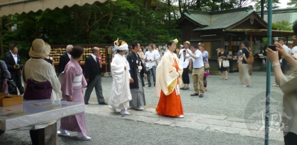 A traditional wedding, with the bride and groom dressed in kimono and hakama