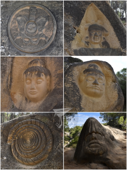 Different faces and shapes carved in sandstone
